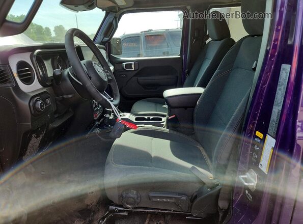 1C6PJTAG3TL156911 2026 JEEP GLADIATOR Purple Widok wnętrza z przodu