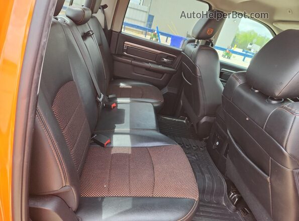 1C6RR6MT9HS584748 2017 RAM 1500 Orange Rear interior view
