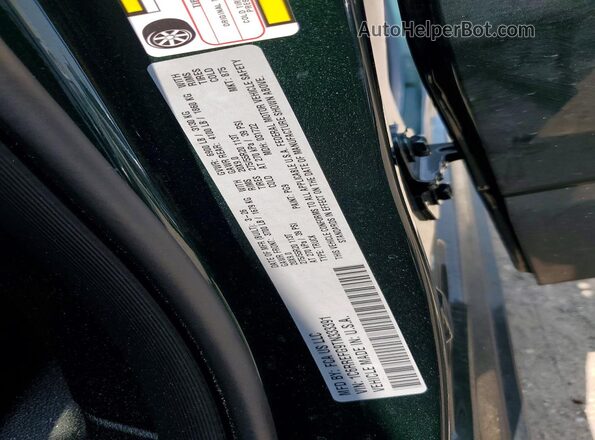 1C6RREFG9TN333391 2026 RAM 1500 Green Engine compartment view