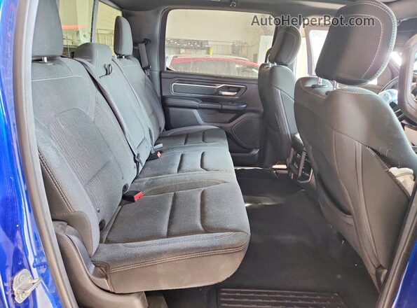 1C6SRFFT5KN864588 2019 RAM 1500 Blue Rear interior view