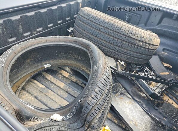 1C6SRFFTXTN234695 2026 RAM 1500 Charcoal Vista del compartimento del motor