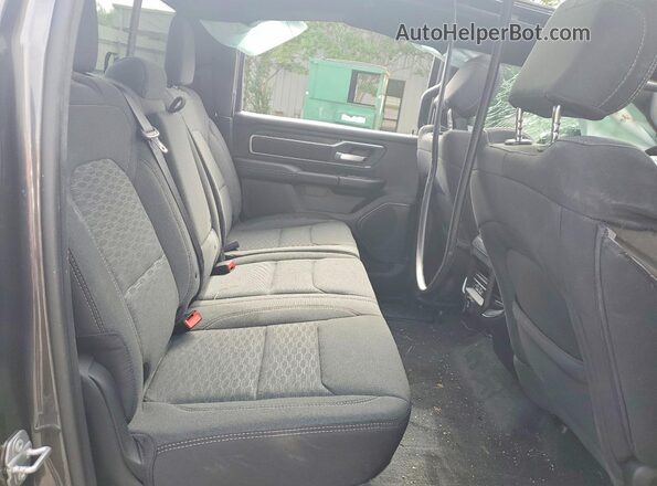 1C6SRFFTXTN234695 2026 RAM 1500 Charcoal Vista de los asientos traseros