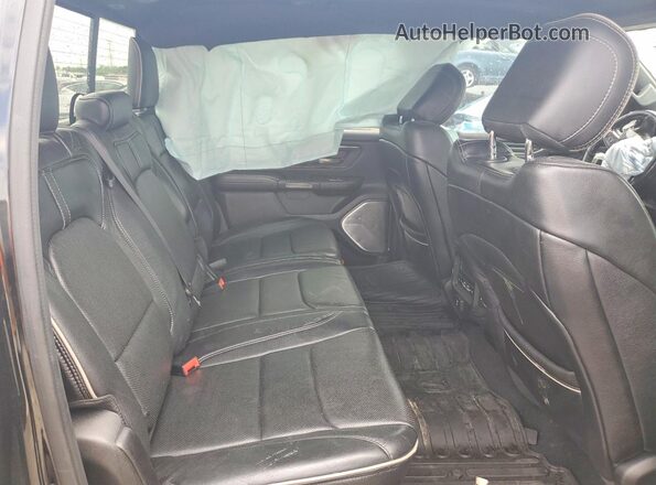 1C6SRFHT4KN626292 2019 RAM 1500 Black Vista de los asientos traseros