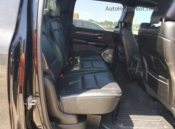 1C6SRFHT7MN555141 2021 RAM 1500 Charcoal Vista de los asientos traseros