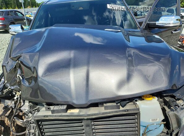 1C6SRFJM1NN237925 2022 RAM 1500 Серый Вид задней части салона