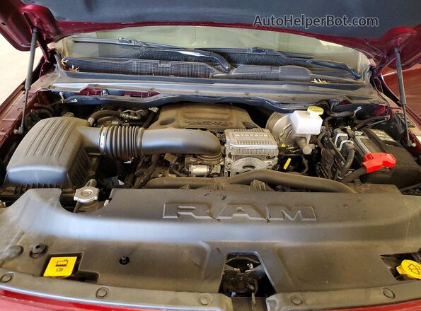 1C6SRFJT2PN634991 2023 RAM 1500 Темно-бордовый Вид задней части салона