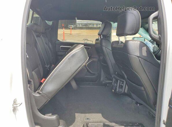 1C6SRFJT2RN130623 2024 DODGE RAM White Vista de los asientos traseros