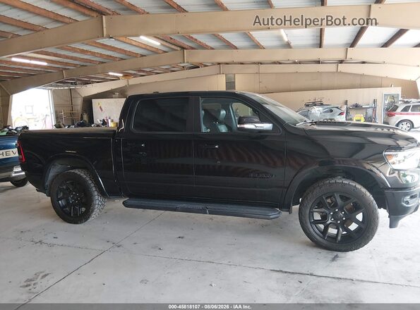1C6SRFJT4MN554071 2021 RAM 1500 Черный Вид задней части салона