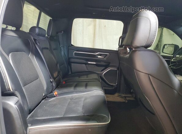 1C6SRFJT5MN736054 2021 RAM 1500 White Vista de los asientos traseros
