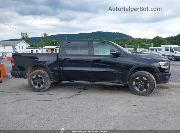 1C6SRFLT8KN915523 2019 RAM 1500 Black Rear interior view