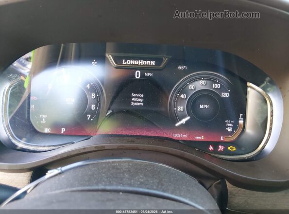 1C6SRFPPXSN667157 2025 RAM 1500 Темно-бордовый Вид задних сидений