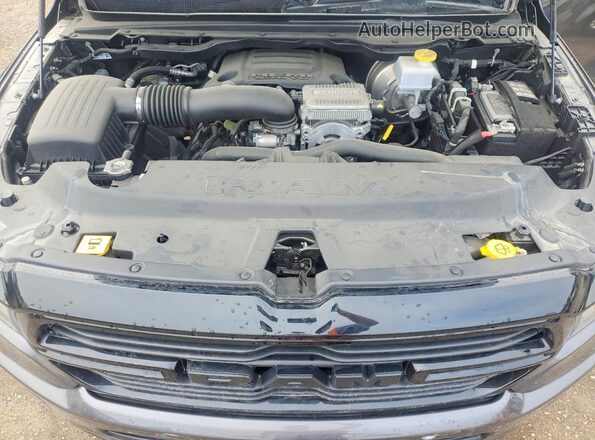 1C6SRFVT3PN597475 2023 RAM 1500 Серый Вид задней части салона