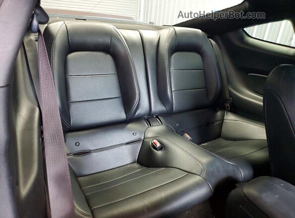 1FA6P8TH8G5228613 2016 FORD MUSTANG Orange Vista de los asientos traseros