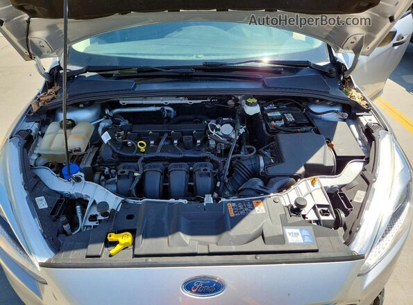 1FADP3E21JL223114 2018 FORD FOCUS Серебряный Вид задней части салона