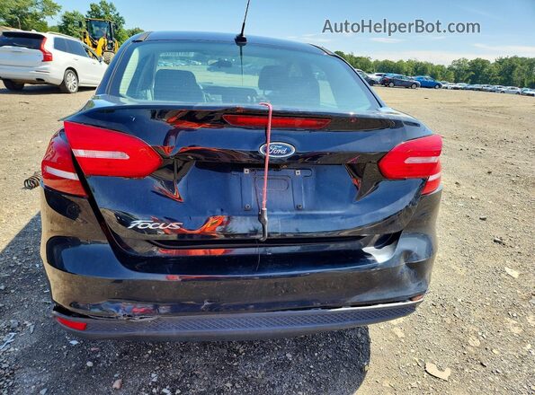 1FADP3E24JL233927 2018 FORD FOCUS Black Rear view