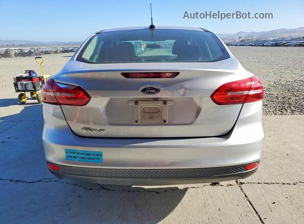 1FADP3E25JL288046 2018 FORD FOCUS Silver Вид ззаду