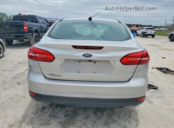 1FADP3E27GL355416 2016 FORD FOCUS Серебряный Вид сзади