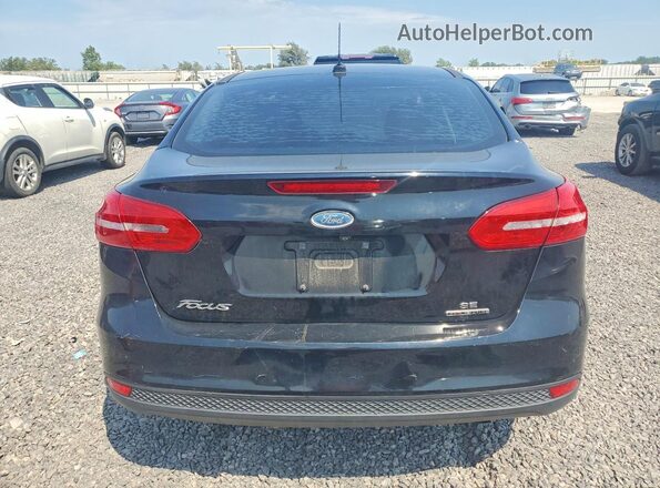 1FADP3F20GL323874 2016 FORD FOCUS Black უკანა ხედი