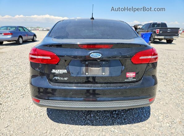 1FADP3F20GL395190 2016 FORD FOCUS Black Հետևի տեսք