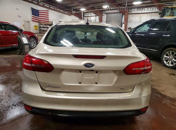 1FADP3F20HL291316 2017 FORD FOCUS Beige Rear view