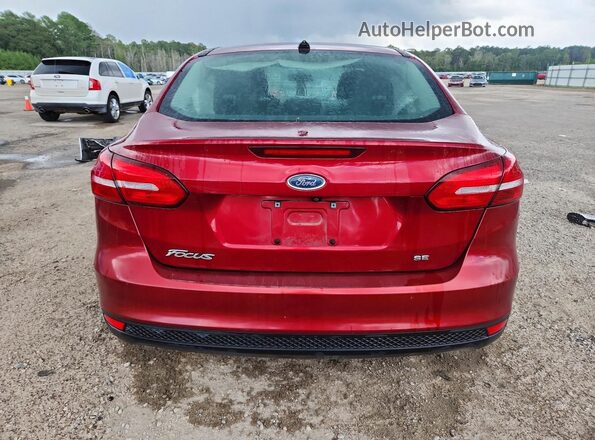 1FADP3F20HL312052 2017 FORD FOCUS Бордовый Вид сзади