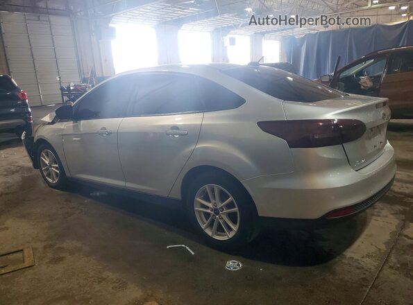 1FADP3F20JL328659 2018 FORD FOCUS Silver Trasero izquierdo