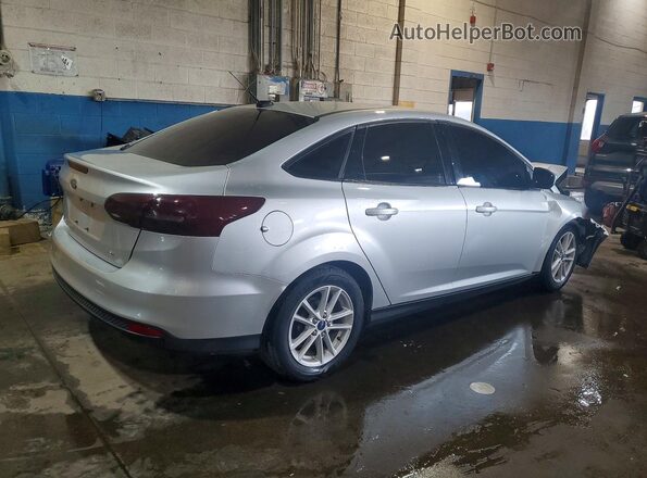 1FADP3F20JL328659 2018 FORD FOCUS Silver Trasero derecho