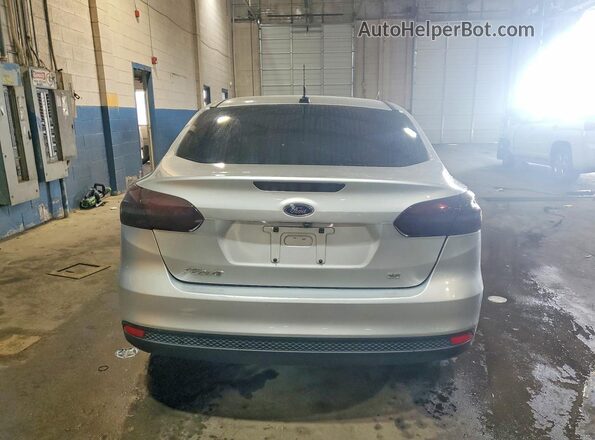 1FADP3F20JL328659 2018 FORD FOCUS Silver Vista trasera