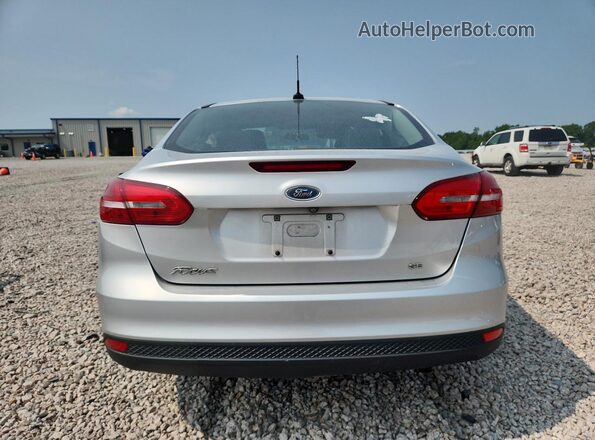 1FADP3F21GL200858 2016 FORD FOCUS Silver Հետևի տեսք
