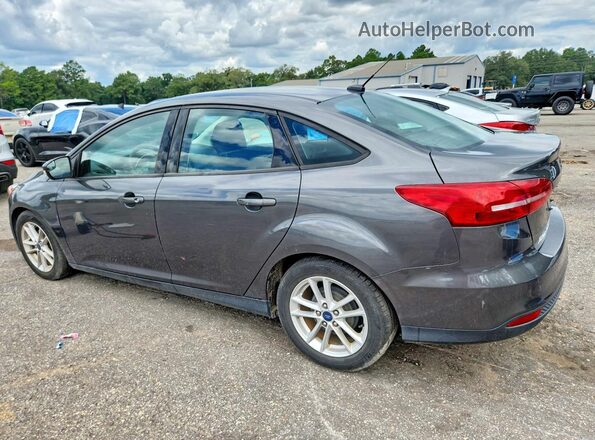 1FADP3F21HL274914 2017 FORD FOCUS Charcoal Rear left