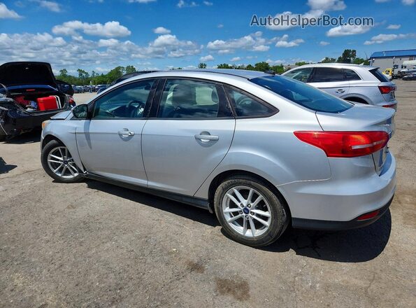 1FADP3F21JL329030 2018 FORD FOCUS Silver Rear left