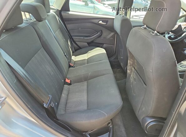 1FADP3F21JL329030 2018 FORD FOCUS Silver Rear seats view