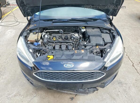 1FADP3F22HL294265 2017 FORD FOCUS Черный Вид задней части салона
