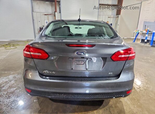1FADP3F22HL297439 2017 FORD FOCUS Gray Vista trasera