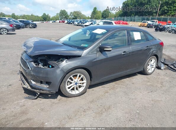 1FADP3F23GL224711 2016 FORD FOCUS Gray Առջևի ձախ երեք քառորդ տեսարան