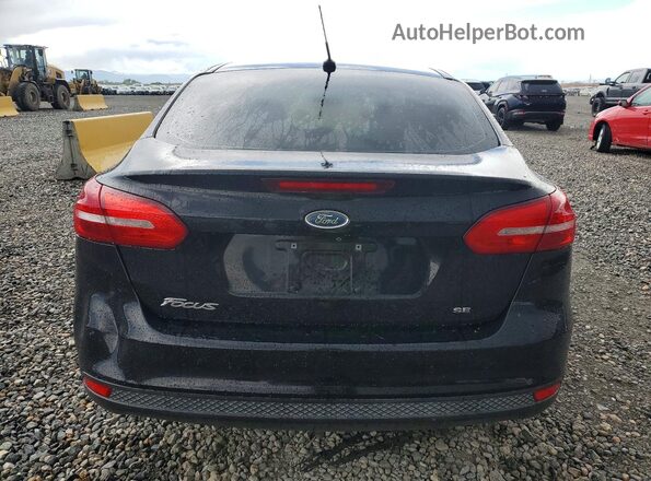 1FADP3F23HL267317 2017 FORD FOCUS Black Հետևի տեսք
