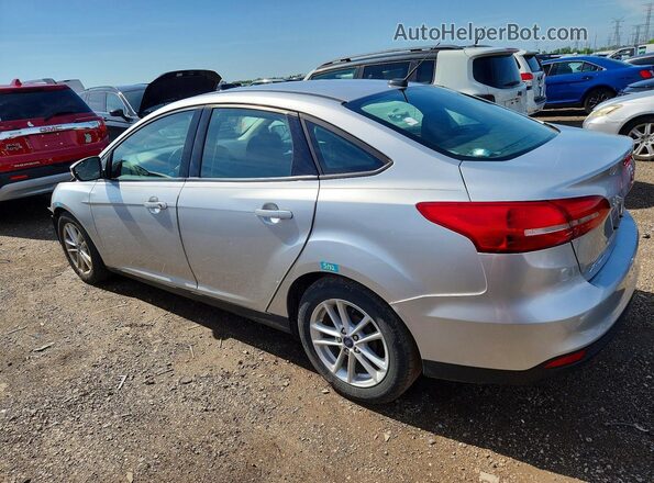 1FADP3F23HL294758 2017 FORD FOCUS Silver Trasero izquierdo