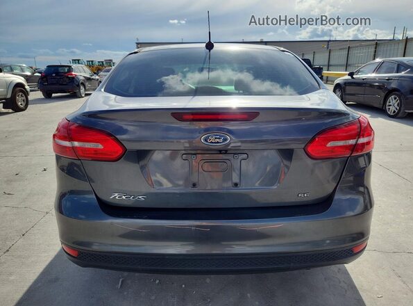 1FADP3F23HL304916 2017 FORD FOCUS Gray Vista trasera
