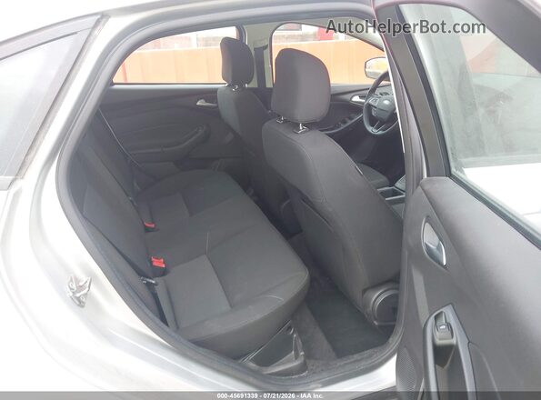 1FADP3F23HL329654 2017 FORD FOCUS Silver VIN კოდის სტიკერის ხედი