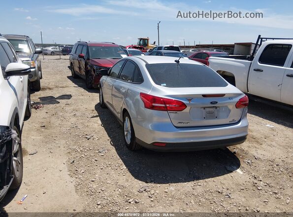 1FADP3F24GL284321 2016 FORD FOCUS Silver Trasero izquierdo