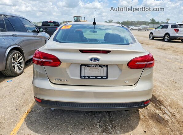 1FADP3F24HL219549 2017 FORD FOCUS Beige Вид ззаду