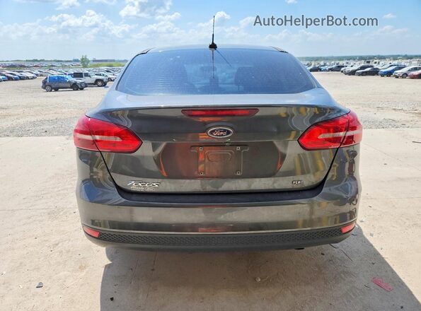 1FADP3F24HL266869 2017 FORD FOCUS Gray Vista trasera
