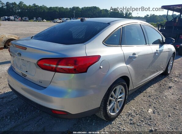 1FADP3F24HL338900 2017 FORD FOCUS Gray Trasero derecho