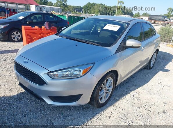 1FADP3F24HL338900 2017 FORD FOCUS Gray Vista tres cuartos delantera izquierda