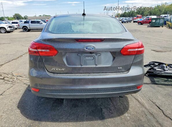1FADP3F24JL271091 2018 FORD FOCUS Gray Vista trasera