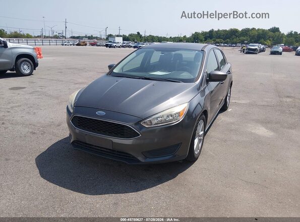 1FADP3F24JL327952 2018 FORD FOCUS Gray Vista tres cuartos delantera izquierda