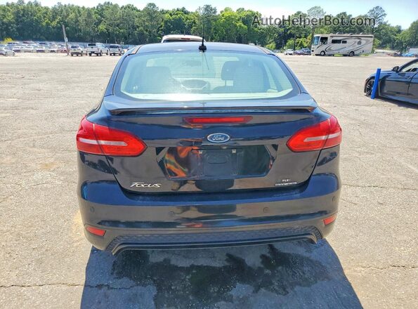 1FADP3F25GL296767 2016 FORD FOCUS Black Widok z tyłu