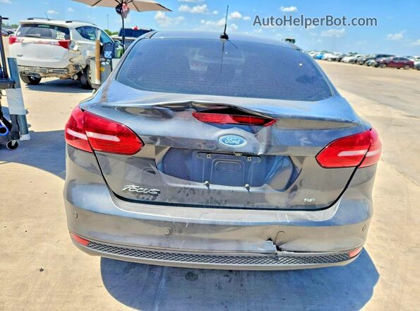 1FADP3F25GL334837 2016 FORD FOCUS Серый Вид сзади