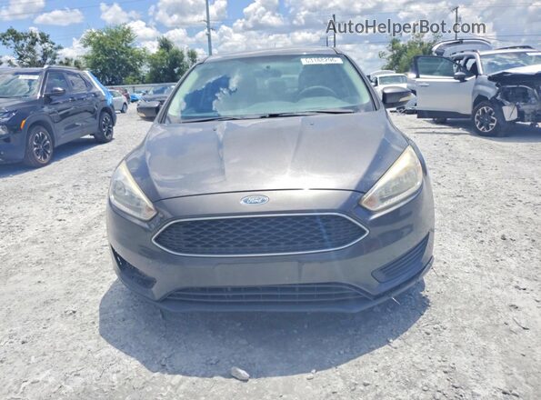 1FADP3F25HL302195 2017 FORD FOCUS Gray Front view
