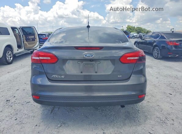 1FADP3F25HL302195 2017 FORD FOCUS Gray Rear view